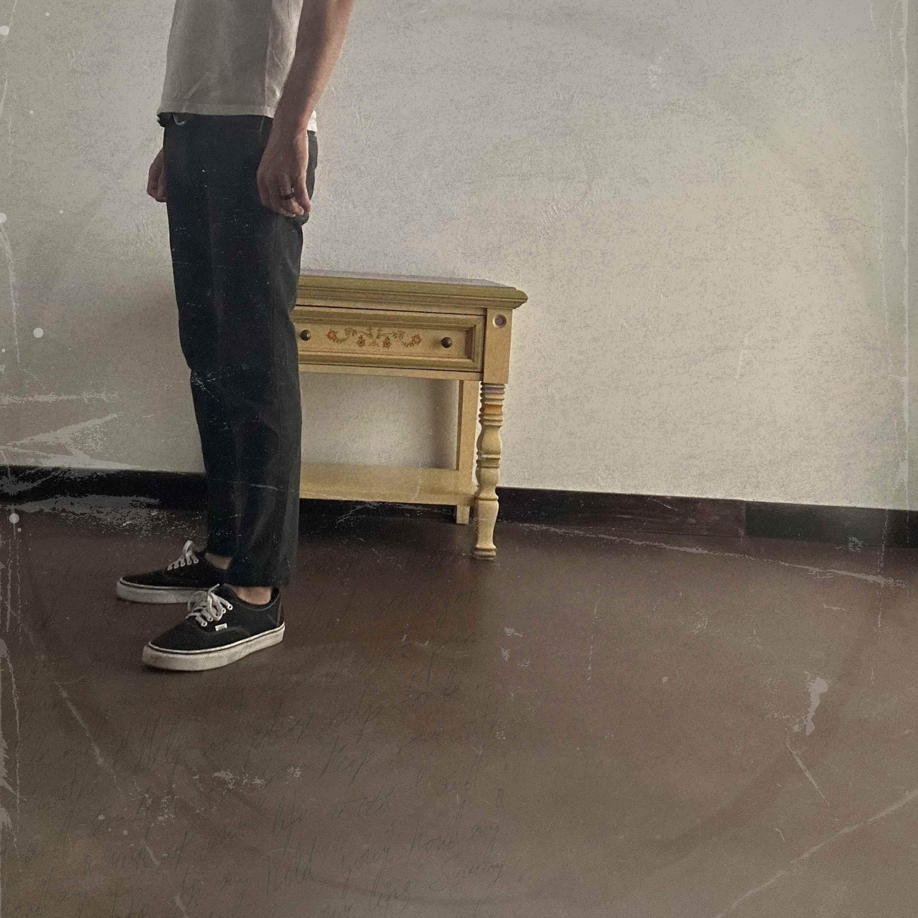 Ryan Terrigno standing in a vintage room